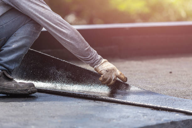 Professional Waterproofing technician working in Hudson, WI